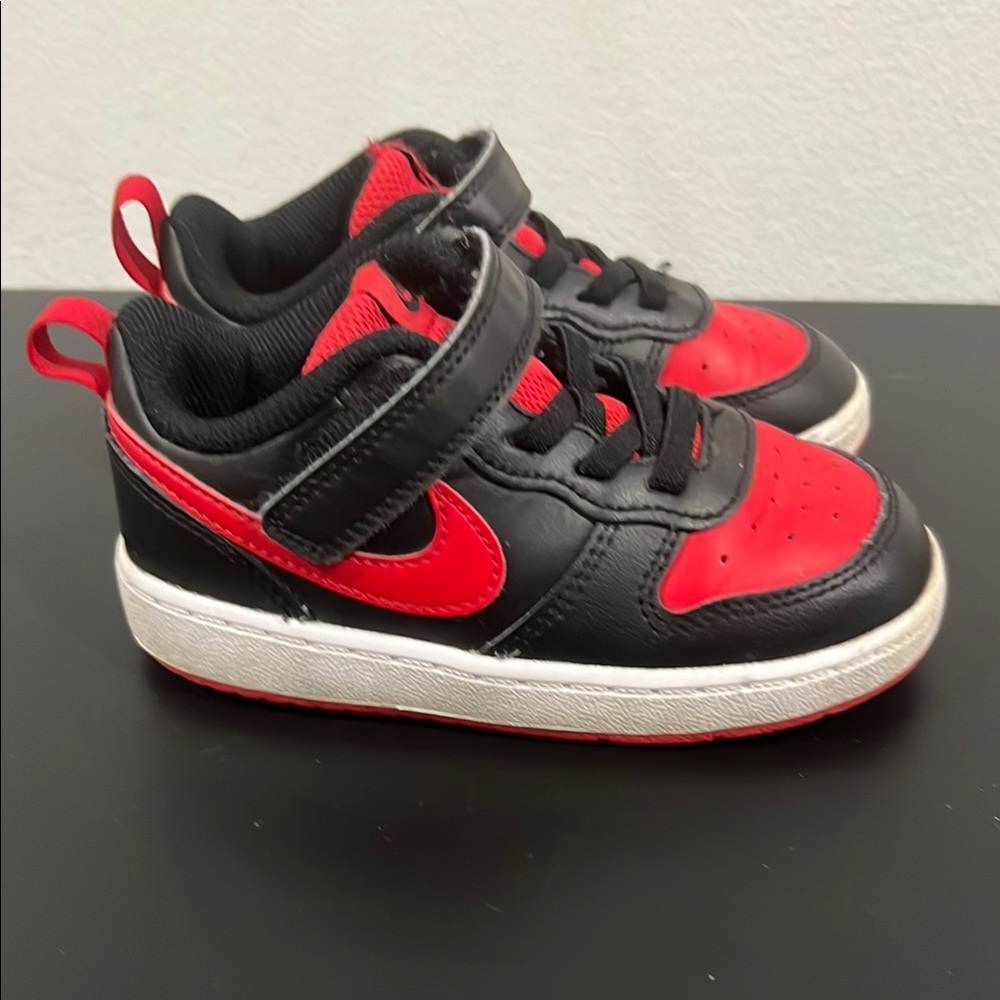 Nike Black and Red Sneakers with Padded Collar and Rubber Outsole